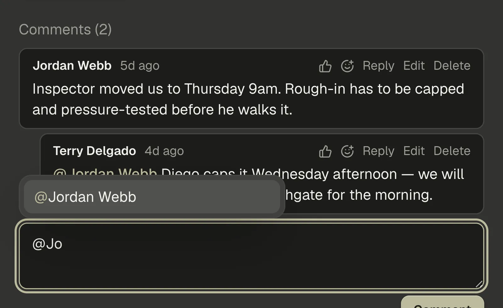A comment being written in the comment box with the @mention list open, and an existing comment above it showing its Reply, Edit and Delete actions.
